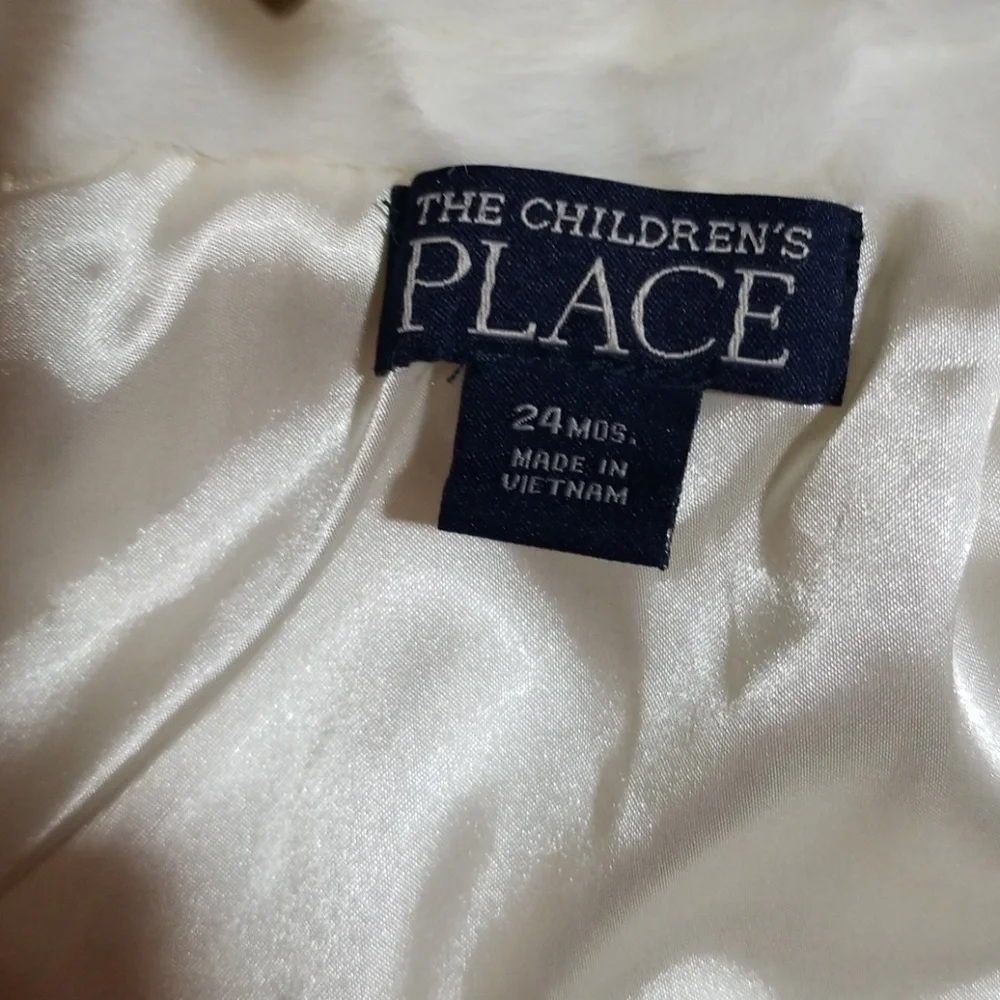 Winter white‎ fur jacket children place